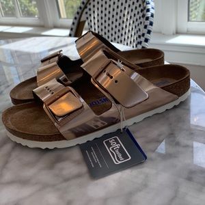 Never worn! Rose gold Arizona Birkenstock sandal